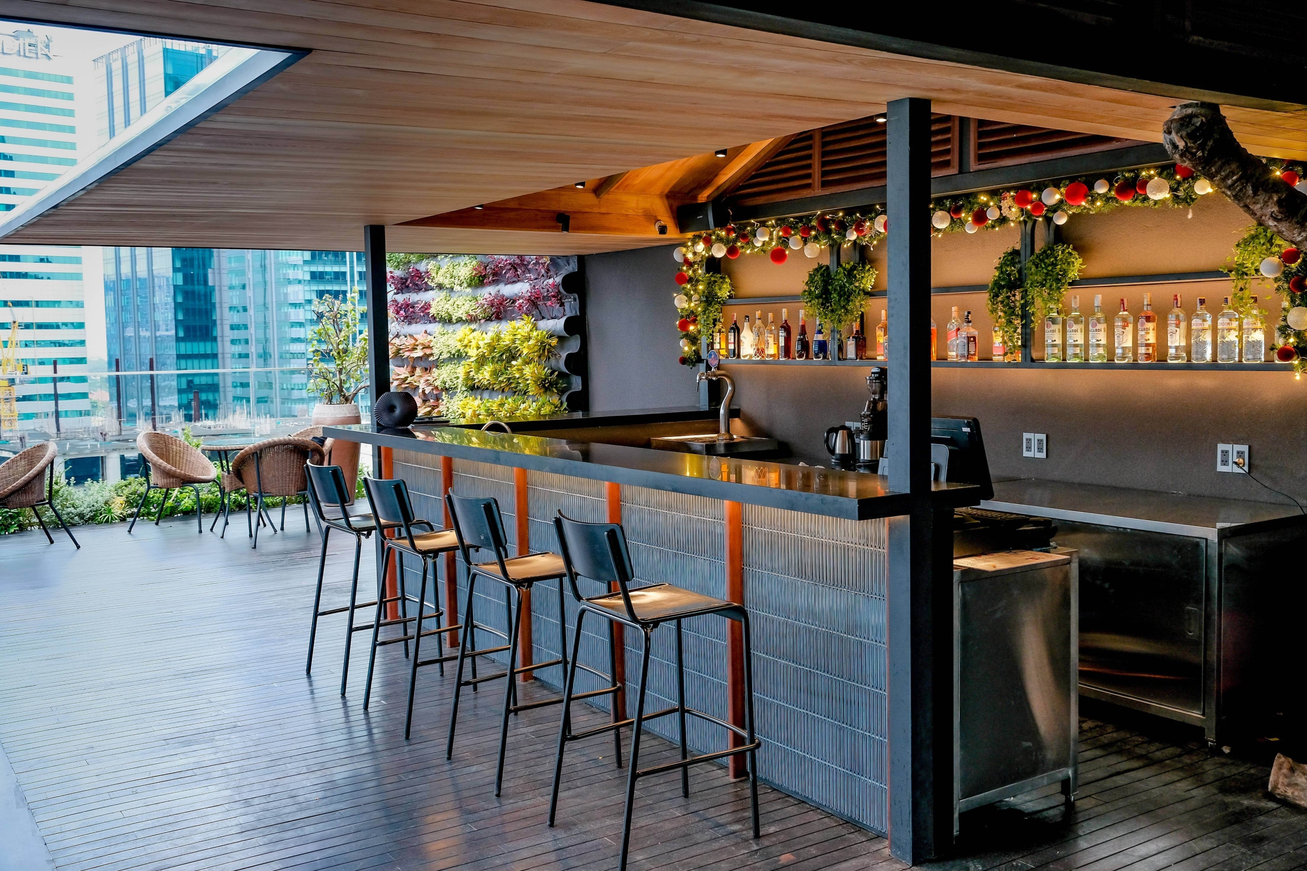 Stories over cocktails at the rooftop bar of Silverland Sakyo Hotel